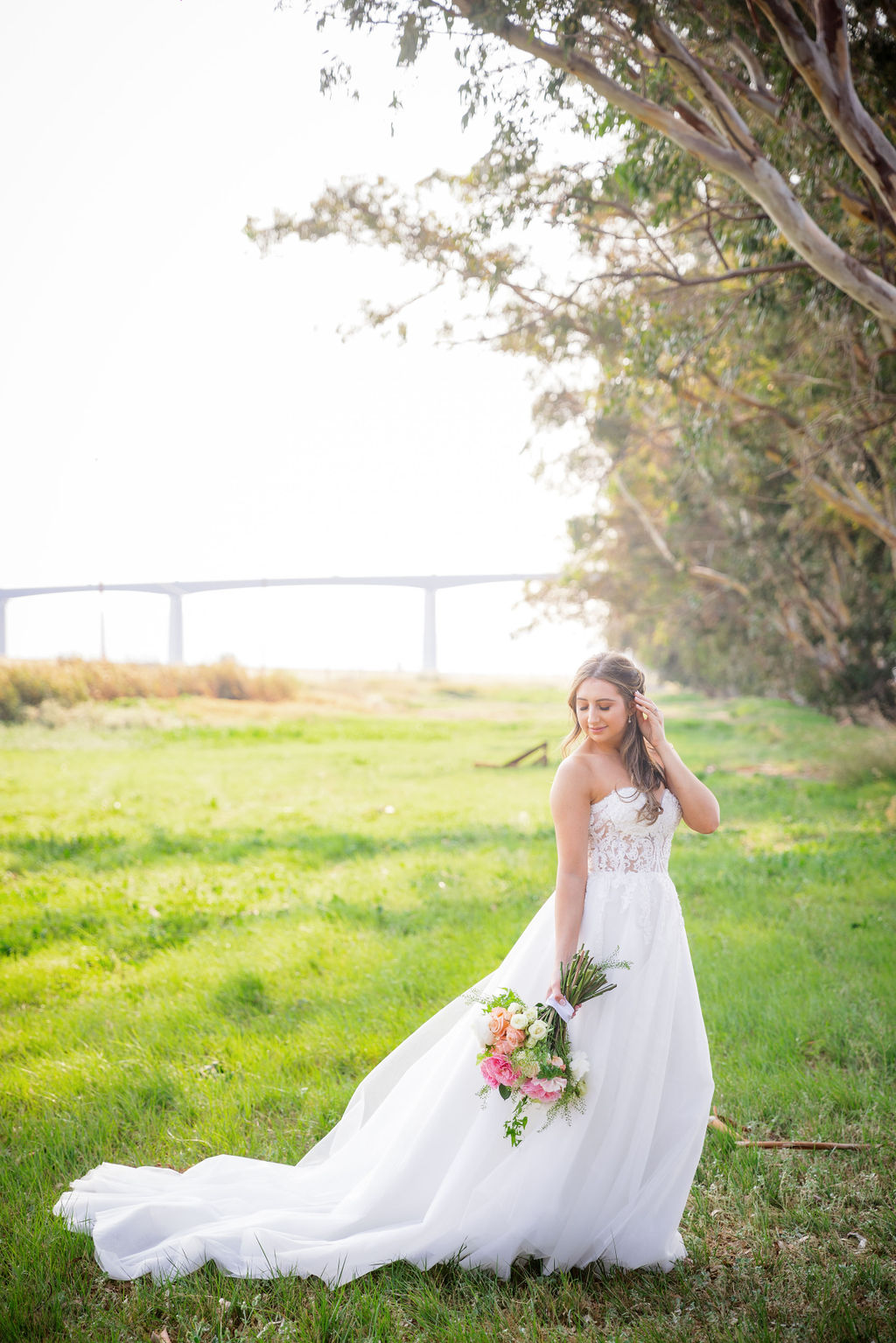 bride in her wedding gown holding flowers
